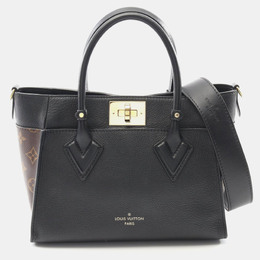 Louis Vuitton: Чёрная сумка 