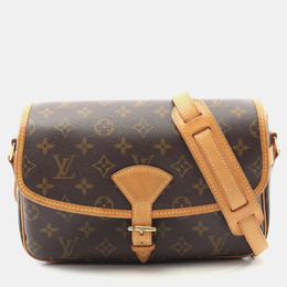 Louis Vuitton: Коричневая сумка 