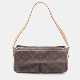Louis Vuitton: Коричневая сумка 