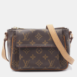 Louis Vuitton: Коричневая сумка 
