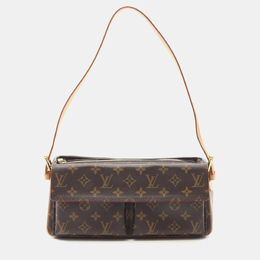 Louis Vuitton: Коричневая сумка 