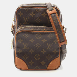 Louis Vuitton: Коричневая сумка 