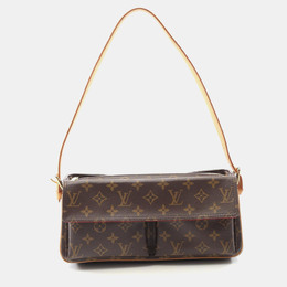Louis Vuitton: Коричневая сумка 