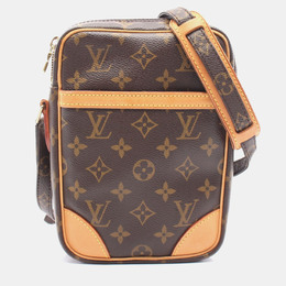 Louis Vuitton: Коричневая сумка 