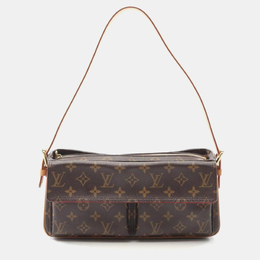 Louis Vuitton: Коричневая сумка 