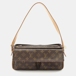 Louis Vuitton: Коричневая сумка 