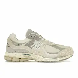 New Balance: Бежевые кроссовки  2002R