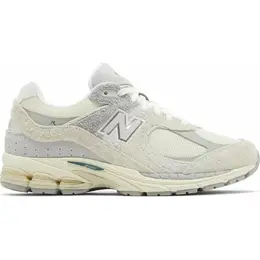 New Balance: Бежевые кроссовки 