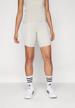 adidas Performance: Бежевые легинсы 