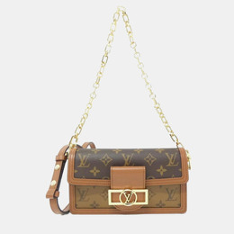 Louis Vuitton: Коричневая сумка 