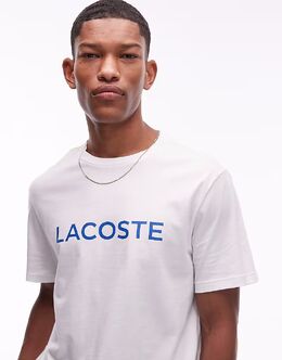 Lacoste: Домашняя футболка 