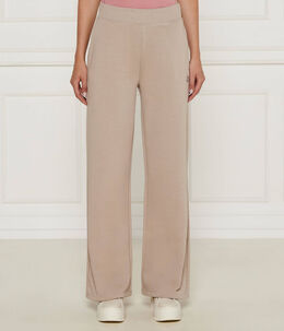 Calvin Klein Jeans: Жёлтые брюки 