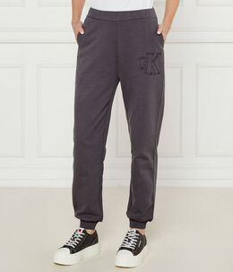 Calvin Klein Jeans: Фиолетовые брюки 