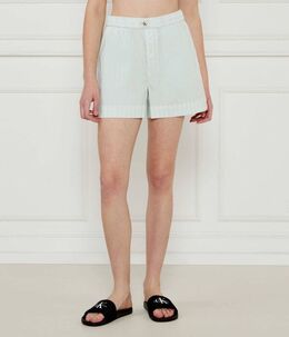 Calvin Klein Jeans: Голубые шорты 