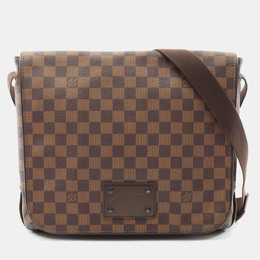 Louis Vuitton: Коричневая сумка 