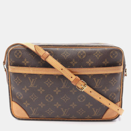 Louis Vuitton: Коричневая сумка через плечо 