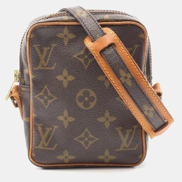 Louis Vuitton: Коричневая сумка через плечо 