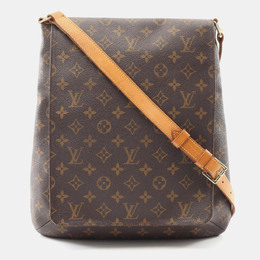 Louis Vuitton: Коричневая сумка через плечо  Musette