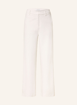 Calvin Klein Jeans: Бежевые брюки 