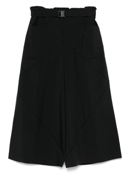 132 5. Issey Miyake: Чёрные брюки 