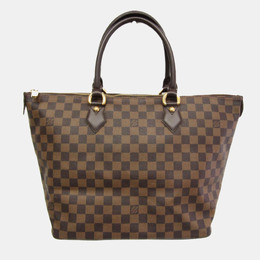 Louis Vuitton: Коричневая сумка 