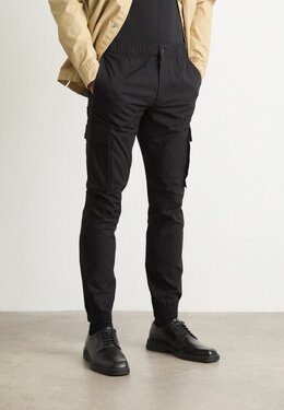 Calvin Klein Jeans: Чёрные брюки 