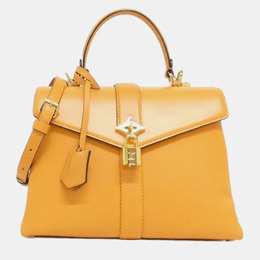 Louis Vuitton: Оранжевая сумка 