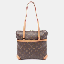 Louis Vuitton: Коричневая сумка 