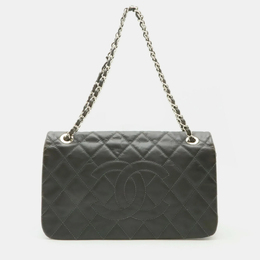 Chanel: Тёмная сумка 