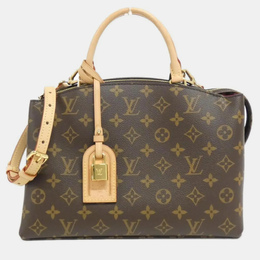 Louis Vuitton: Коричневая сумка 