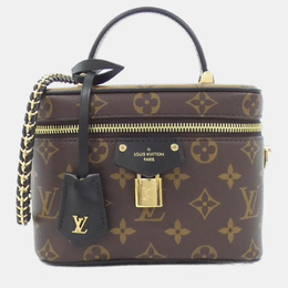 Louis Vuitton: Коричневая сумка 