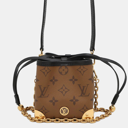 Louis Vuitton: Коричневый кошелёк 