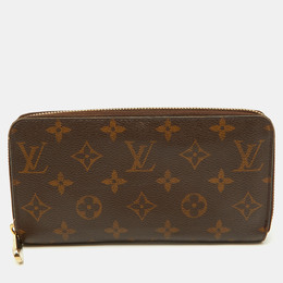 Louis Vuitton: Коричневый кошелёк  Zippy