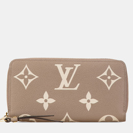 Louis Vuitton: Бежевый кошелёк  Zippy