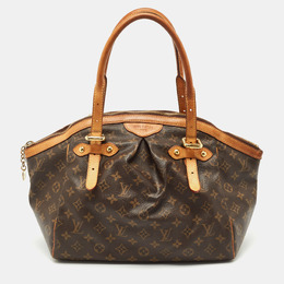 Louis Vuitton: Коричневая сумка 