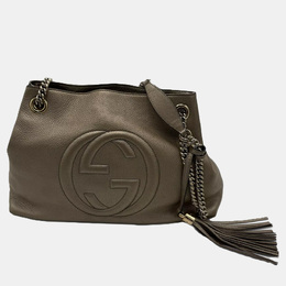 Gucci: Коричневая сумка  Soho
