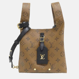Louis Vuitton: Коричневая сумка 