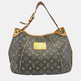Louis Vuitton: Коричневая сумка 