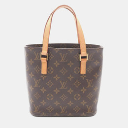 Louis Vuitton: Коричневая сумка 