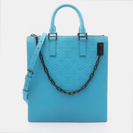 Louis Vuitton: Голубая сумка-шоппер 