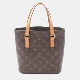 Louis Vuitton: Коричневая сумка 