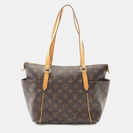 Louis Vuitton: Коричневая сумка 