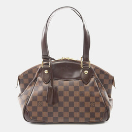 Louis Vuitton: Коричневая сумка 