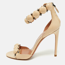 Alaia: Бежевые сандалии 