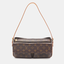 Louis Vuitton: Коричневая сумка 