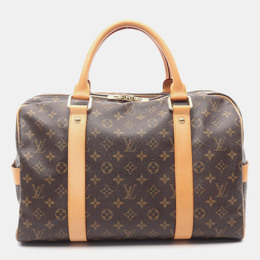 Louis Vuitton: Коричневая сумка 