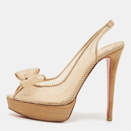 Christian Louboutin: Бежевые туфли 