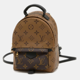 Louis Vuitton: Коричневый рюкзак 