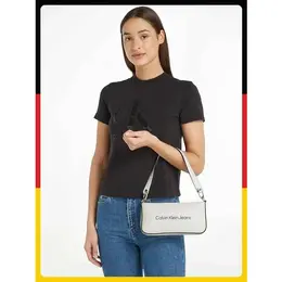 Calvin Klein Jeans: Серая сумка 