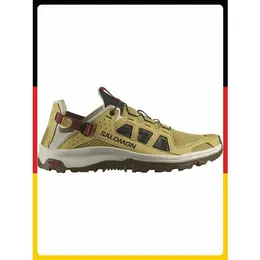 Salomon: Жёлтые кроссовки 
